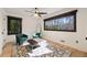 Bright bedroom featuring natural light from two windows, hardwood floors and a sitting area at 4217 Paces Ferry Se Rd, Atlanta, GA 30339