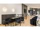 The dining area features a built-in bench and modern lighting near the kitchen island at 4217 Paces Ferry Se Rd, Atlanta, GA 30339