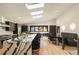 Bright, open kitchen featuring a large waterfall island, skylights, and modern finishes at 4217 Paces Ferry Se Rd, Atlanta, GA 30339