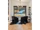 Stylish sitting area features a modern light fixture and a large window showcasing the outdoor view at 4217 Paces Ferry Se Rd, Atlanta, GA 30339