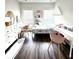 Cozy bedroom with two desks, chair, and ample natural light at 1411 Wisteria Wall Dr, Suwanee, GA 30024