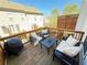 Back deck with outdoor furniture and a grill at 1411 Wisteria Wall Dr, Suwanee, GA 30024