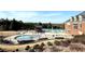View of outdoor pools and landscaping in a community setting, offering space for recreation and relaxation at 1411 Wisteria Wall Dr, Suwanee, GA 30024