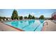 A beautiful swimming pool with plenty of seating for residents and guests at 1411 Wisteria Wall Dr, Suwanee, GA 30024