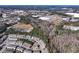 An aerial view of townhomes in a well-situated community near commercial areas and green spaces at 3180 Spicy Cedar Ln, Lithonia, GA 30038
