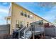 View of the back deck and fenced yard of this lovely townhome with lots of windows at 3180 Spicy Cedar Ln, Lithonia, GA 30038