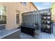 Backyard patio with modern outdoor furniture and plant shelf at 3180 Spicy Cedar Ln, Lithonia, GA 30038