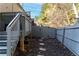 Backyard access with stairs leading down from the deck at 3180 Spicy Cedar Ln, Lithonia, GA 30038
