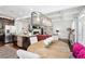 Open floor plan showcases the dining area, kitchen, and living room for seamless living at 3180 Spicy Cedar Ln, Lithonia, GA 30038