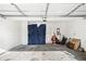 Spacious garage with white walls and concrete flooring at 3180 Spicy Cedar Ln, Lithonia, GA 30038