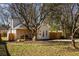 Backyard featuring home exterior, wooden deck, privacy fence, with mature trees providing shade at 731 Hobart Se Ave, Atlanta, GA 30312