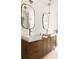 Elegant bathroom featuring double vanities, modern lighting, and chic design at 731 Hobart Se Ave, Atlanta, GA 30312