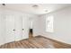 Light-filled bedroom with hardwood floors, neutral walls, and standard double-door closet at 731 Hobart Se Ave, Atlanta, GA 30312