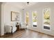 Bright entryway with hardwood floors, stylish decor, and plenty of natural light at 731 Hobart Se Ave, Atlanta, GA 30312