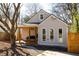 Charming bungalow with a welcoming front porch and modern gray siding, complemented by a neatly landscaped yard at 731 Hobart Se Ave, Atlanta, GA 30312
