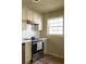 Bright kitchen featuring stainless steel appliances and hardware floors at 731 Hobart Se Ave, Atlanta, GA 30312