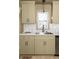 Bright kitchen featuring shaker cabinets, stainless steel sink, and subway tile backsplash at 731 Hobart Se Ave, Atlanta, GA 30312