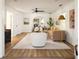 Inviting living room featuring modern furniture, hardwood floors, and an open layout at 731 Hobart Se Ave, Atlanta, GA 30312