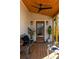 Stylish front porch featuring wood flooring, a seating area, and exterior lighting at 731 Hobart Se Ave, Atlanta, GA 30312