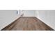Finished basement area featuring stylish shiplap walls and hardwood flooring at 3532 Dial Dr, Stone Mountain, GA 30083