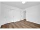 This bedroom has two closets, hardwood floors and white walls at 3532 Dial Dr, Stone Mountain, GA 30083