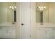 Bathroom featuring double sink vanities at 6195 Mountainwell Dr, Roswell, GA 30075