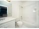 Bathroom with white sink and vanity and tub and shower combo at 6195 Mountainwell Dr, Roswell, GA 30075