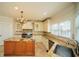 Spacious kitchen features granite countertops, an island, stainless steel appliances, and ample cabinet space at 6195 Mountainwell Dr, Roswell, GA 30075