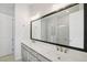 Beautiful bathroom with dual sinks, a vanity with gray cabinets, and a walk-in shower at 671 Stickley Oak Way, Woodstock, GA 30189