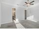 Spacious bedroom featuring neutral carpet, a ceiling fan, and natural lighting at 671 Stickley Oak Way, Woodstock, GA 30189