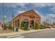 Brick building with storefront: Dress Up Boutique, featuring modern architecture with an upscale facade at 671 Stickley Oak Way, Woodstock, GA 30189