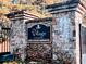 Stone entrance sign for The Village at Towne Lake by David Pearson Communities at 671 Stickley Oak Way, Woodstock, GA 30189
