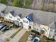 Aerial view of townhouse community showing rooftops, parking, and landscaping at 1769 Old Dogwood, Jonesboro, GA 30238