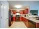 Practical kitchen offers ample cabinet space and flows into other living areas at 1769 Old Dogwood, Jonesboro, GA 30238
