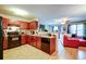 Cozy kitchen with black appliances, wood cabinetry, and an open layout at 1769 Old Dogwood, Jonesboro, GA 30238