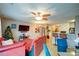 The living room with modern furniture and a breakfast bar is ideal for entertaining at 1769 Old Dogwood, Jonesboro, GA 30238