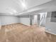 Expansive basement with plush carpeting, offering ample space for recreation or storage at 2473 Chauncey Sw Ln, Marietta, GA 30064