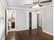 Main bedroom featuring hardwood floors, a ceiling fan and an ensuite bathroom at 2695 Terratim Ln, Decatur, GA 30034