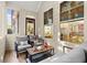 Relaxing sunroom with cozy seating and abundant natural light, perfect for enjoying peaceful moments at 2797 Middlecreek Way, Cumming, GA 30041