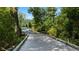 Picturesque walking path in community, surrounded by lush greenery at 3062 Hawthorn Farm Blvd, Loganville, GA 30052