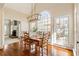 Dining area with large windows that provide ample natural light at 4155 Park Brooke Dr, Alpharetta, GA 30022