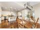 Open kitchen and dining area with stainless steel appliances and hardwood floors at 4155 Park Brook Dr, Alpharetta, GA 30022