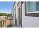 Modern balcony showing clean white siding, dark trim, and black railing at 1096 Glen Opal Dr, Decatur, GA 30032