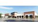 Modern building complex with varied facade featuring large store fronts, street parking, and pedestrian walkways at 1096 Glen Opal Dr, Decatur, GA 30032