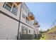 Exterior apartment view with siding, multiple windows, and small balconies at 1096 Glen Opal Dr, Decatur, GA 30032