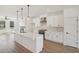 Modern kitchen features white cabinets, stainless steel appliances and quartz countertops at 1096 Glen Opal Dr, Decatur, GA 30032