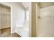 Bathroom featuring a tub shower and closet at 2921 Russ Ln, Lithonia, GA 30058
