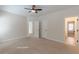 Bedroom featuring neutral walls and carpet with open door ways at 3529 S Sherwood Se Rd, Smyrna, GA 30082