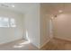Corner bedroom featuring a window, plush carpeting, and neutral colored walls at 3529 S Sherwood Se Rd, Smyrna, GA 30082