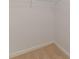 Neutral walk-in closet featuring wire shelving and plush carpeting at 3529 S Sherwood Se Rd, Smyrna, GA 30082
